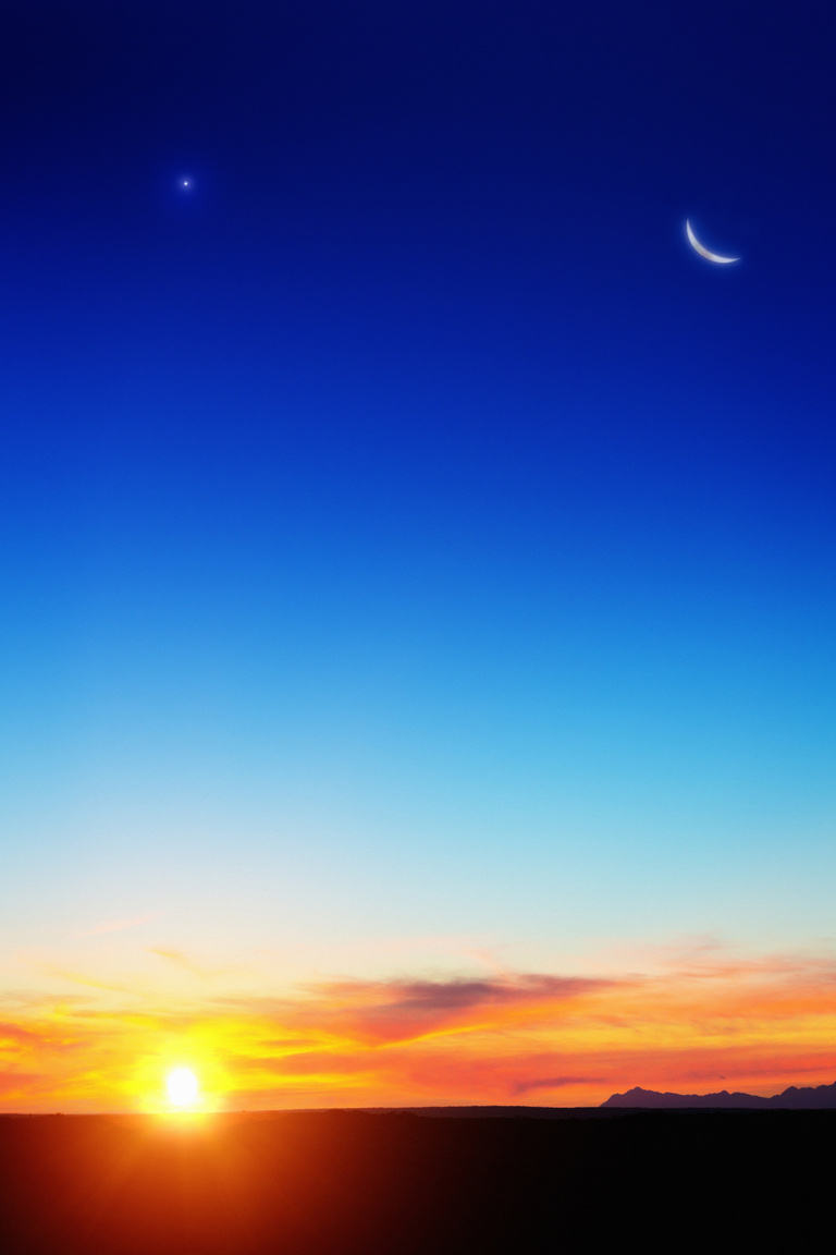 New moon and Venus at beautiful sunrise